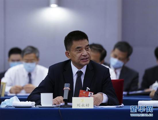  5月23日，全國政協(xié)委員劉永好在政協(xié)聯(lián)組會(huì)上發(fā)言。新華社記者 謝環(huán)馳 攝