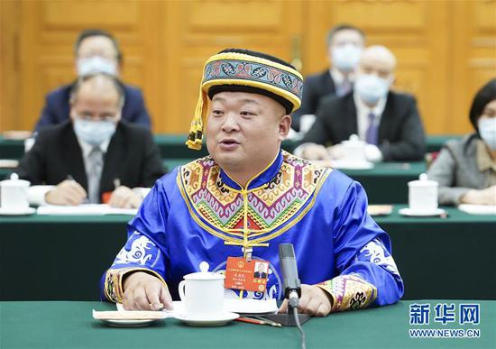  5月24日，全國人大代表宋慶禮參加湖北代表團(tuán)的審議并發(fā)言。新華社記者 黃敬文 攝